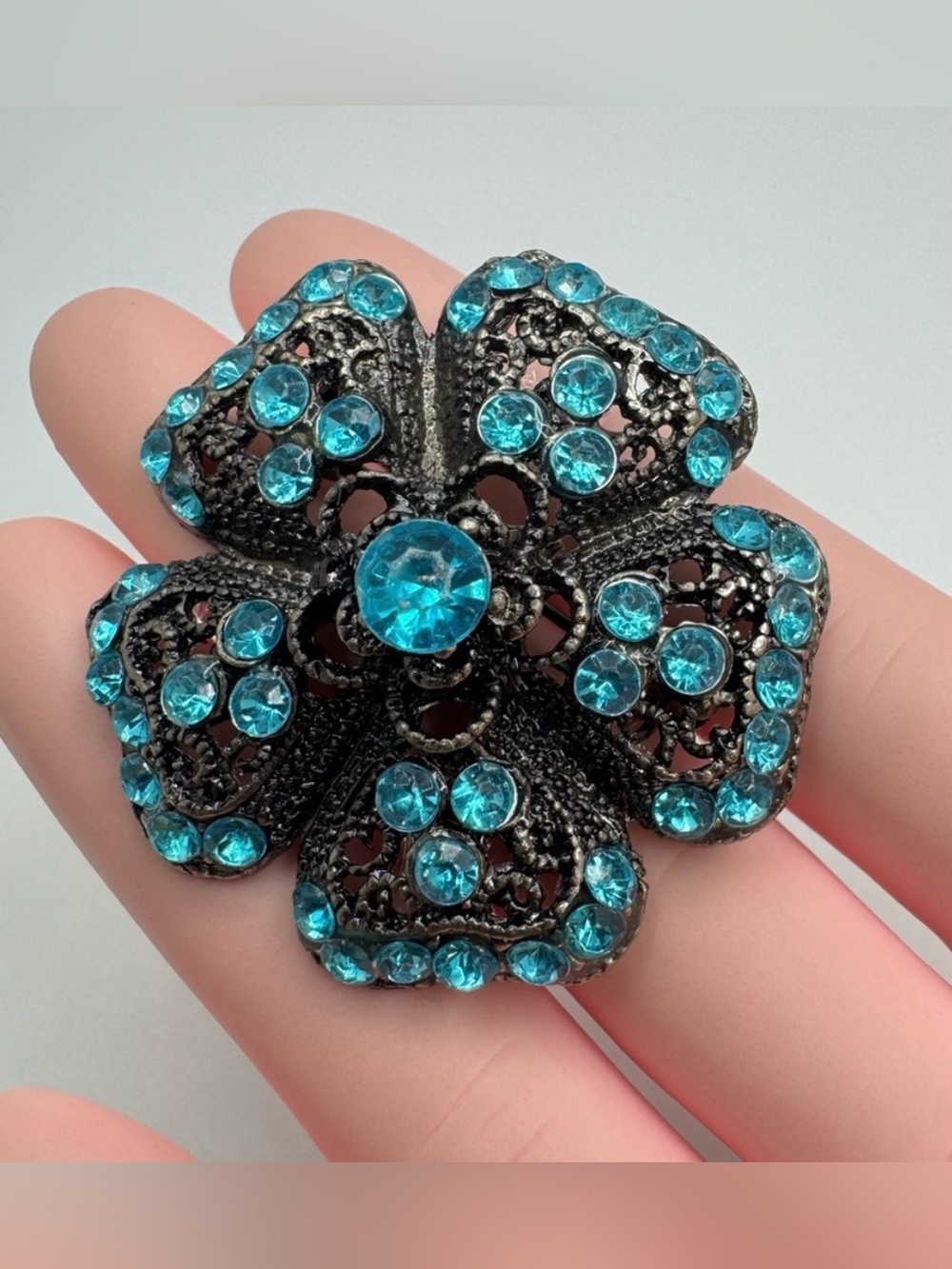 Blue Rhinestone Flower Brooch Silver Tone Filigree Vintage Style